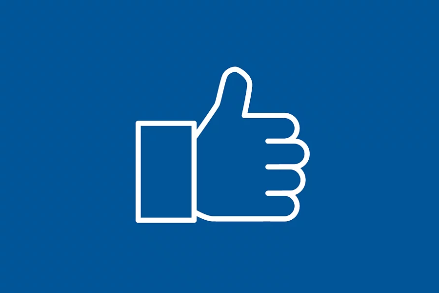 青い背景に親指を立てた白いアイコン